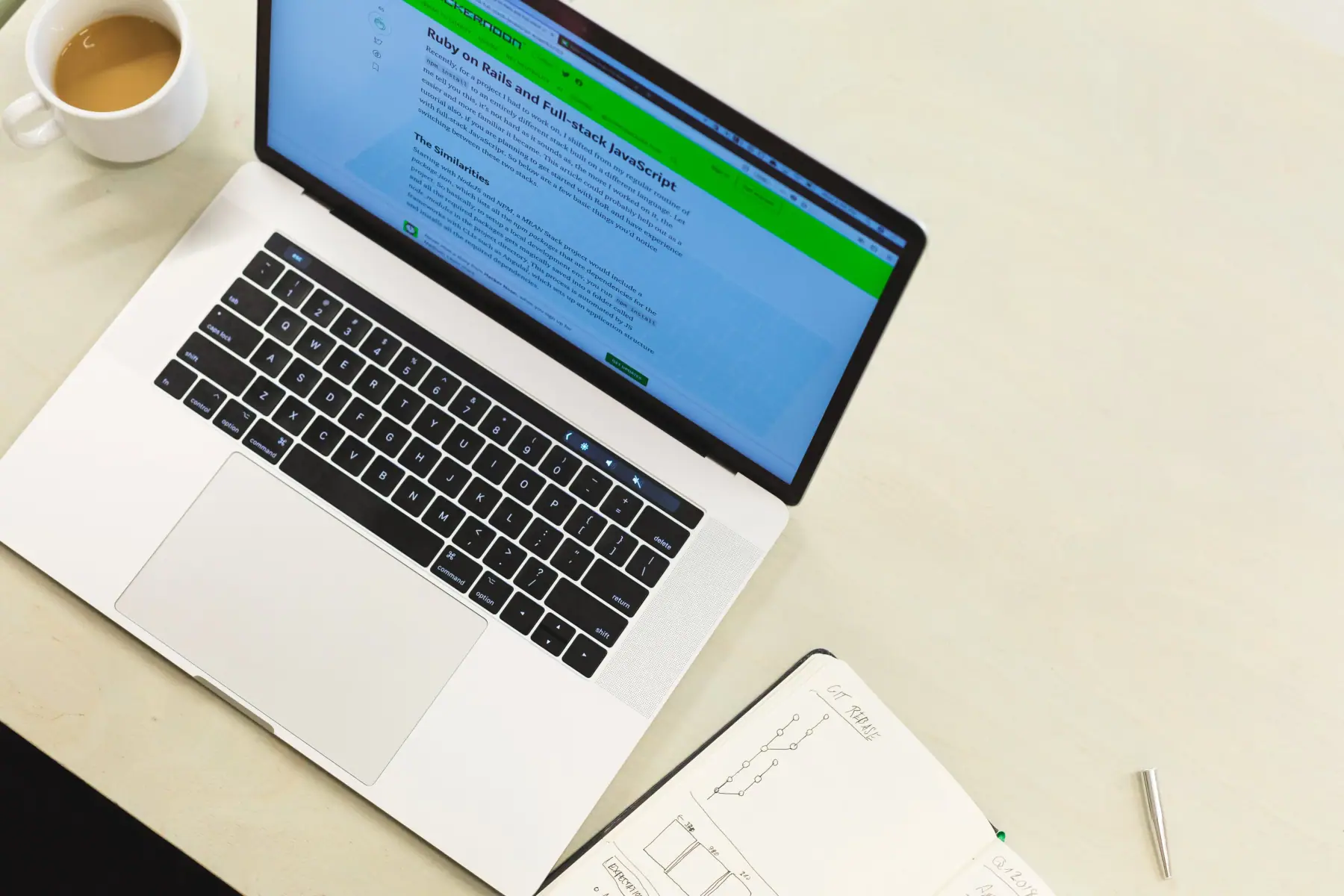 Person taking notes on their laptop